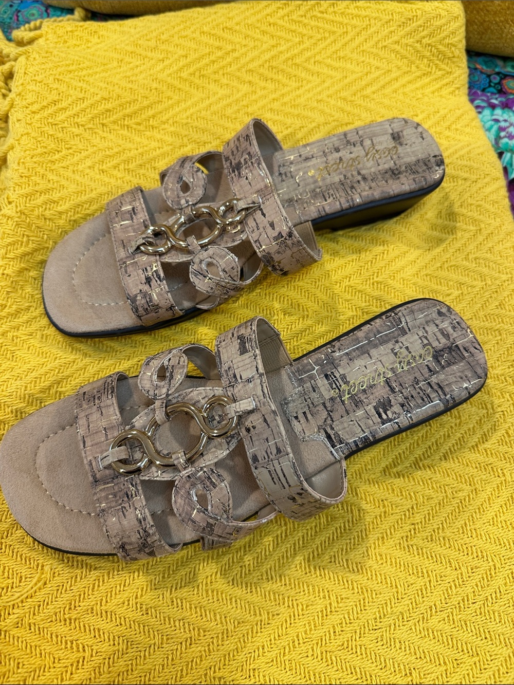 Tan and gold sandals